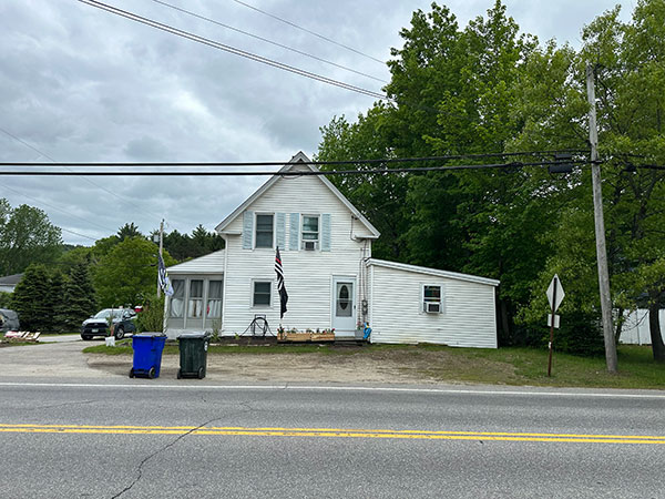 Before White To Blue Siding Replacement Project